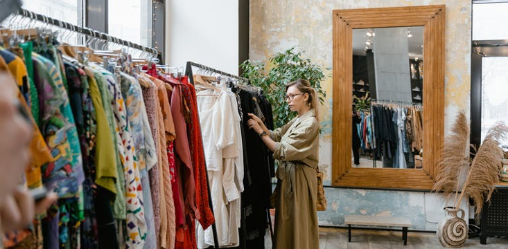How to retain budget-conscious consumers, clothes shopping in thrift store