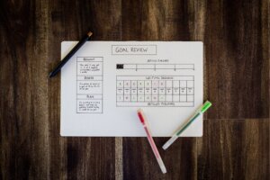 How to set effective goals for your busine, business planner with pens on wooden table