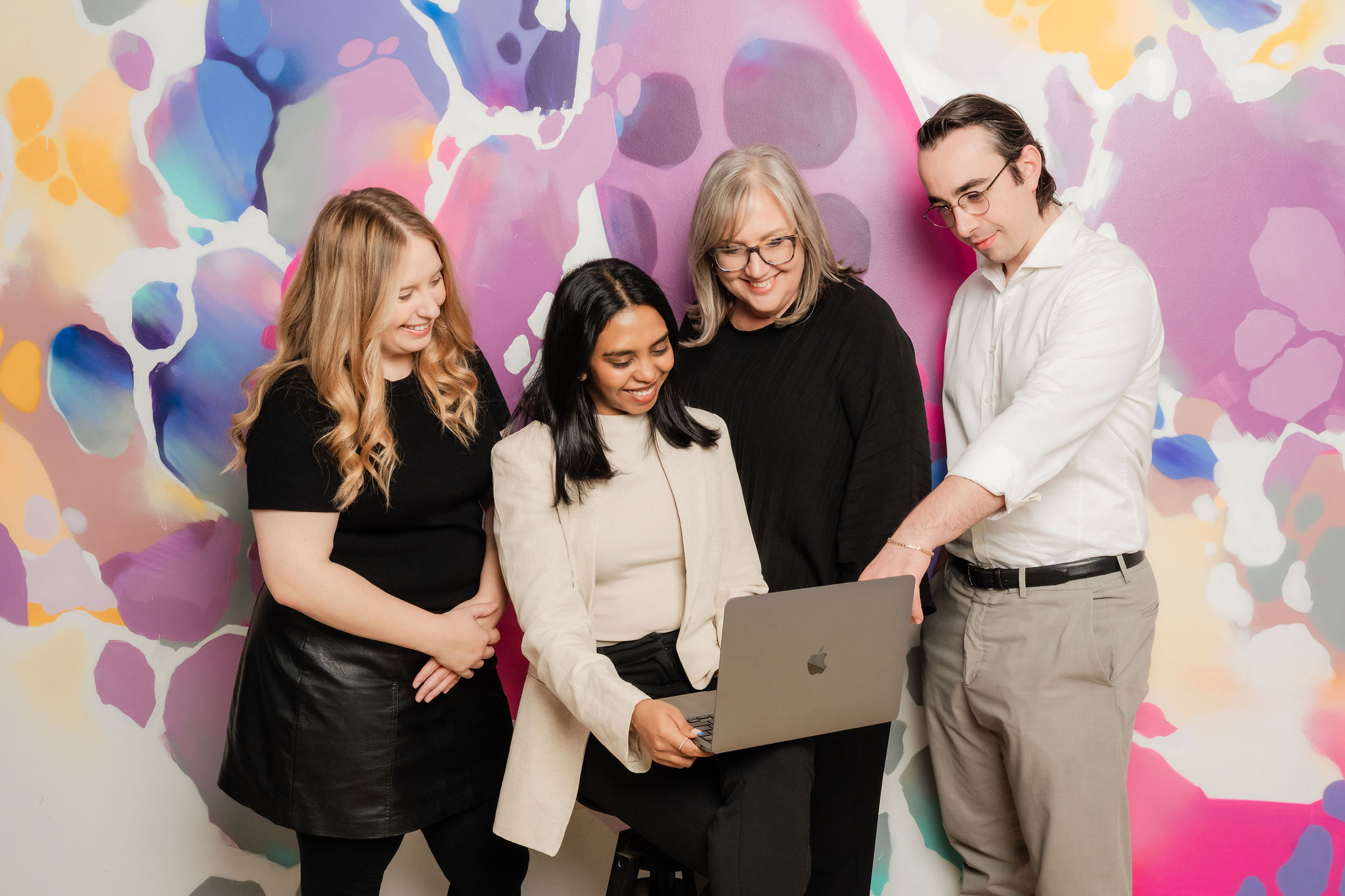 The Purple Giraffe team discussing outsourced vs fractional marketing strategies to support business growth.